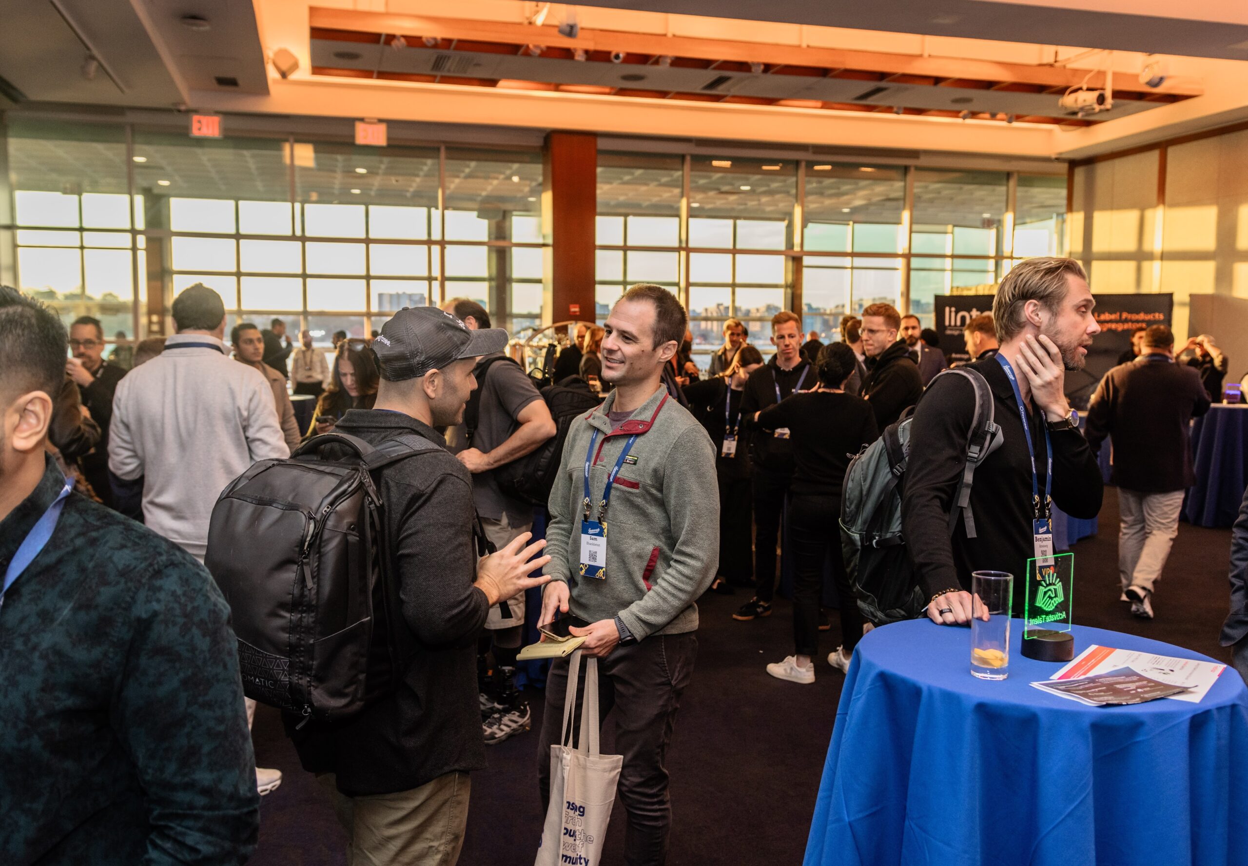 Attendees meeting on the floor at a past Innovate event